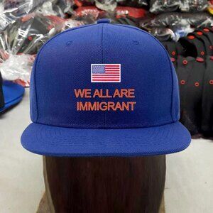 WE ALL ARE IMMIGRANT MEN'S CAP